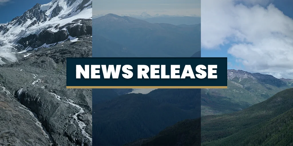 News release banner with white text on a dark navy band over a mountain landscape photograph with snow and clouds.