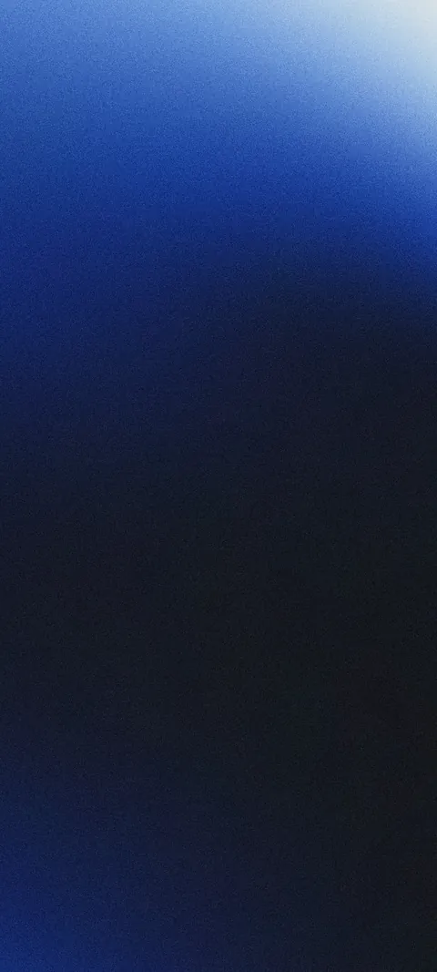 Soft grainy gradient in deep blue fading to near-black navy, with a pale glow at the top.
